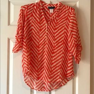 Coral and cream blouse